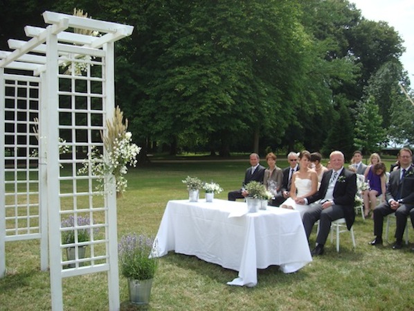 outdoor ceremony with arch_provence theme wedding_Annika_598x449